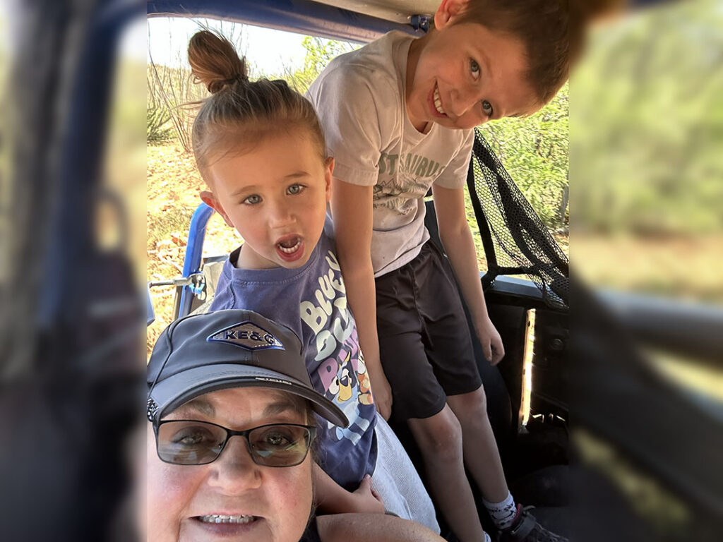 Chris with grandkids