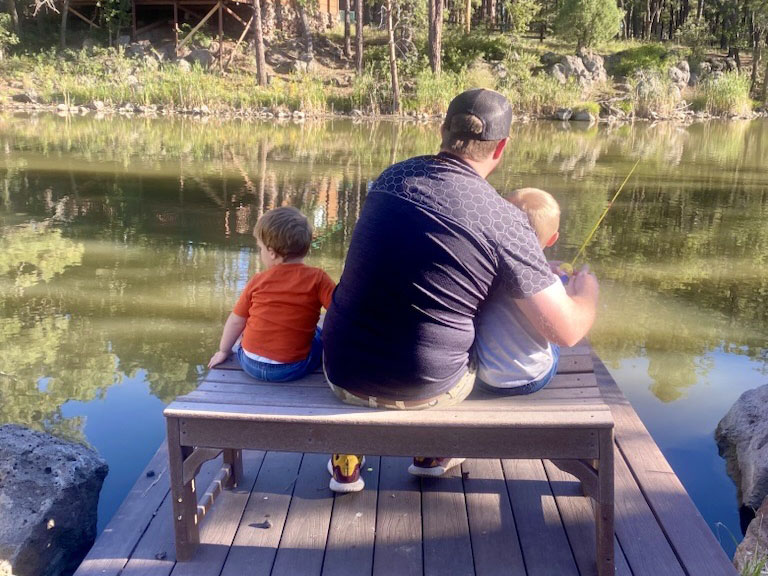 Justin fishing with kids
