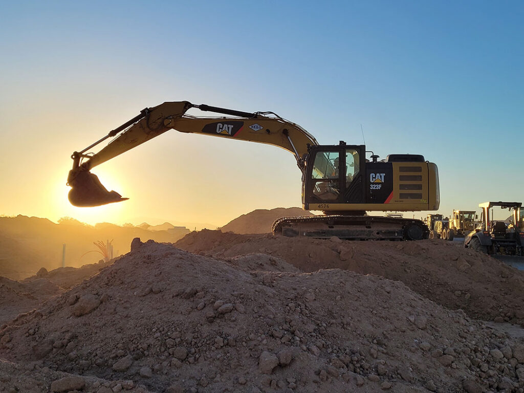excavator at sunrise