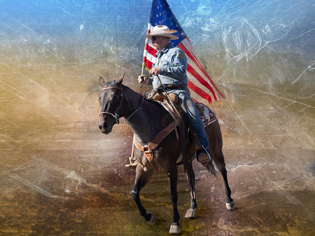 Teryl riding a horse with an american flag