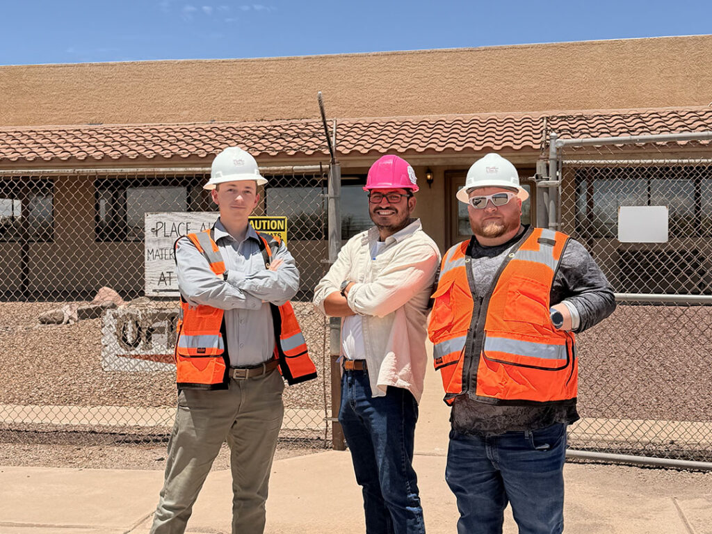 three construction workers
